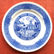 Illustration for article titled Sci-fi Chinese porcelain plates show giant robots and alien invasions